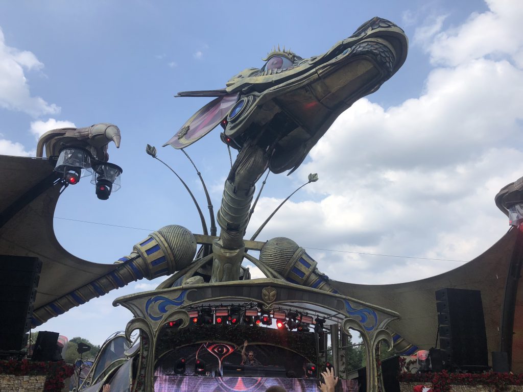 HUGEL performing beneath the dragon stage at Tomorrowland 2018